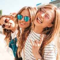 Teens smiling Brava hidden braces